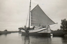 The Spes Mea somewhere in Friesland with a partially furled mainsail